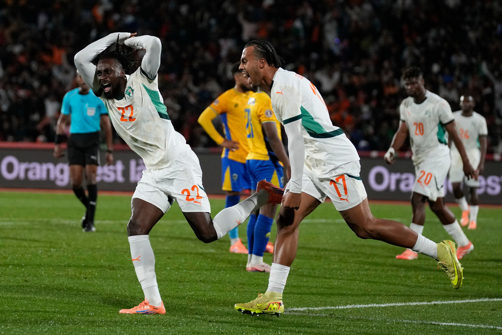 Ivory Coast's Evann Guessand celebrates after scoring during the Africa Cup of Nations group F soccer match between Gabon and Ivory Coast, in Marrakech, Morocco, Wednesday, Dec. 31, 2025. (AP Photo/Themba Hadebe)